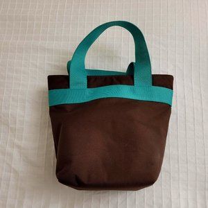 Milano brown and turquois insulated lunch bag with plastic containers.